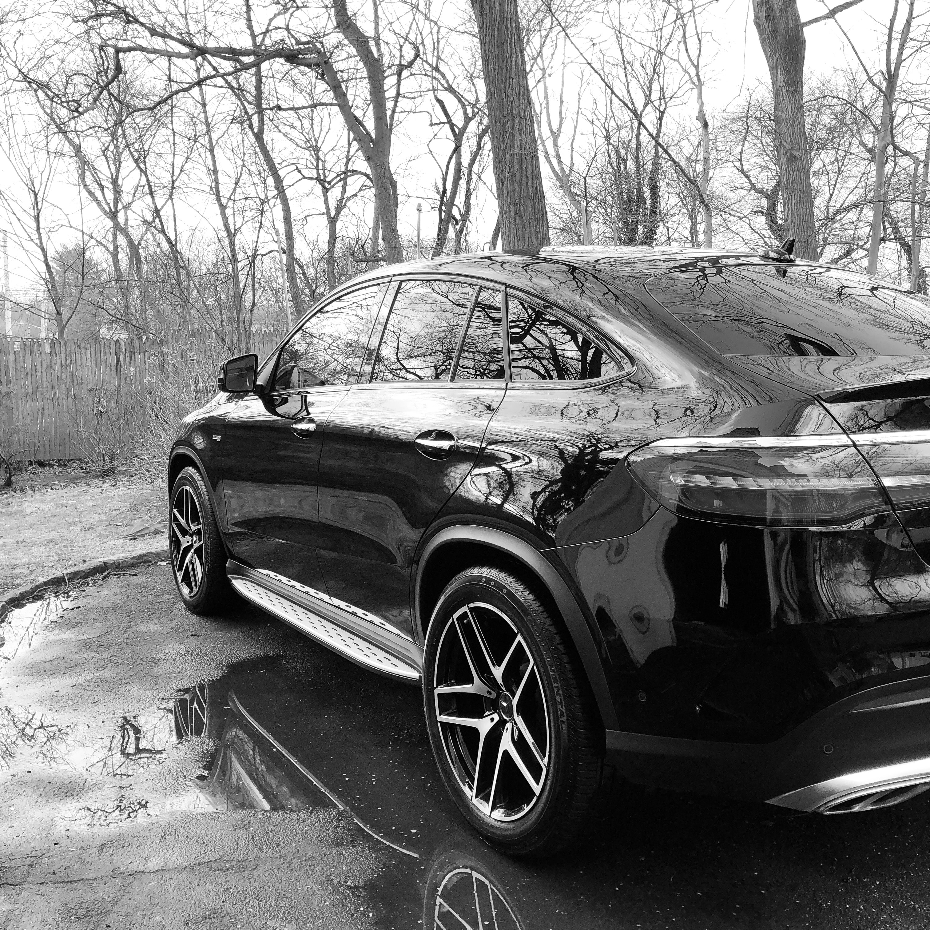 Black Mercedes-AMG GLE coupe gleaming in black and white after detailing